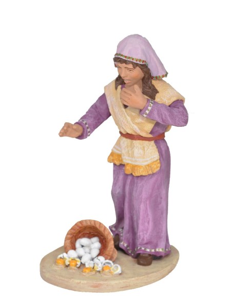 Niña con cesto de huevos rota