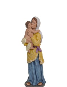 Pastora besando niño en brazos. Fabricado en pasta cerámica Italiana.