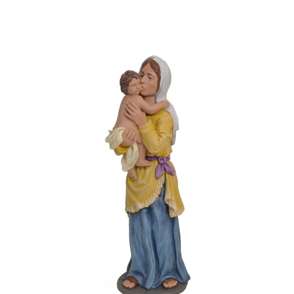 Pastora besando niño en brazos. Fabricado en pasta cerámica Italiana.
