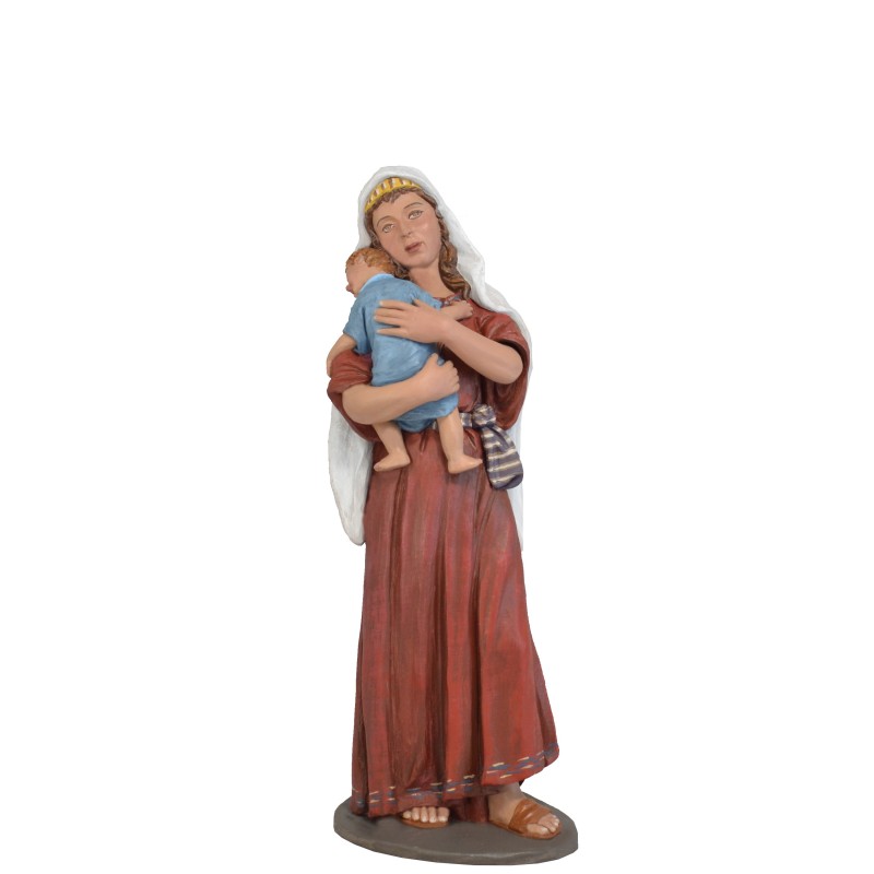Pastora niño en brazos. Fabricado en pasta cerámica Italiana.
