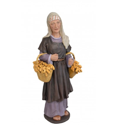 Anciana con cestas de dátiles. Fabricado en pasta cerámica Italiana