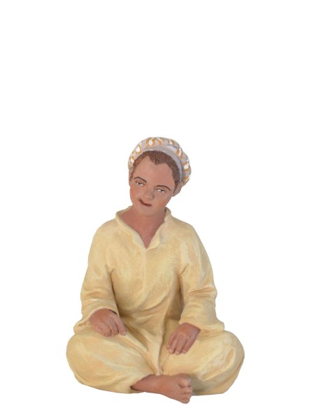 19076-5 Niño sentado "moruno"- Fabricado en pasta cerámica Italiana.