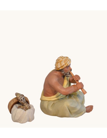 14112 Flautista con cesta serpiente. Fabricado en pasta cerámica Italiana.