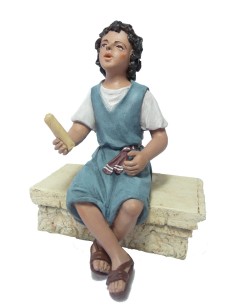 19040 Niño sentado pies cruzados. Fabricado en pasta cerámica Italiana