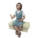 Niño sentado pies cruzados. Fabricado en pasta cerámica Italiana