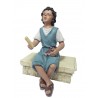 Niño sentado pies cruzados. Fabricado en pasta cerámica Italiana