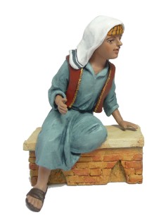 19042 Niño sentado recostado. Fabricado en pasta cerámica Italiana
