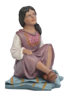 19044 Niña sentada pies cruzados - Fabricado en pasta cerámica Italiana.