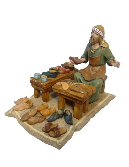 Conjunto zapatero con mesas y manta