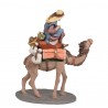 Pastor a camello con carga