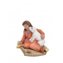 Niña sentada con perrito - Fabricado en pasta cerámica Italiana.