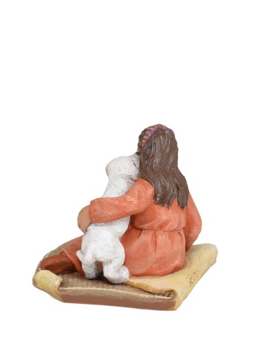 Niña sentada con perrito
