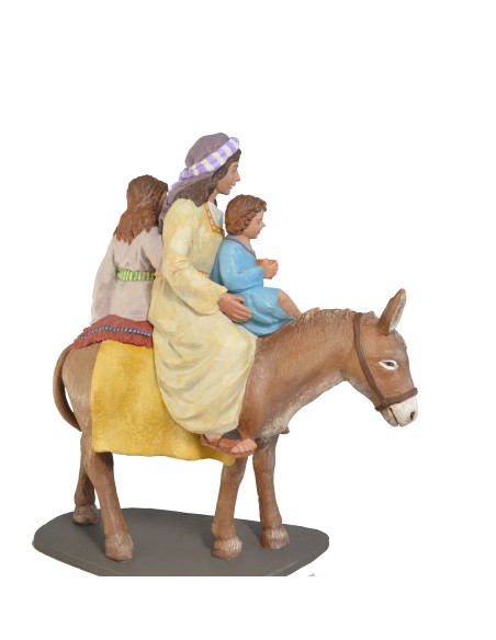 Burro con mujer y niños Burro con mujer y niños